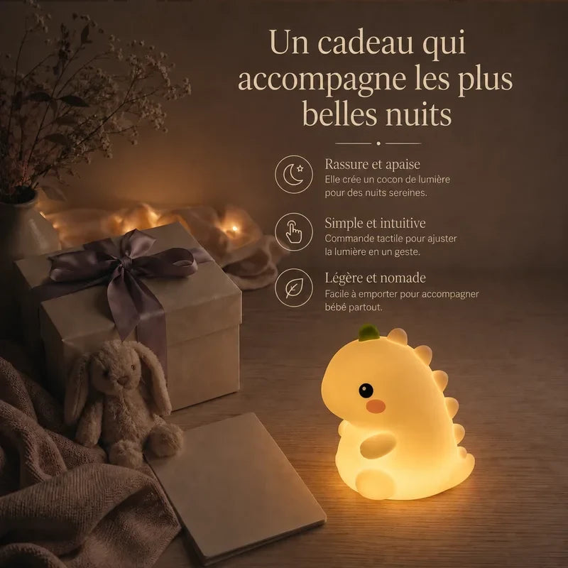 Veilleuse dinosaure T-Rex tactile rechargeable, de couleur orange, présentée dans une ambiance cadeau avec une boîte et un ruban.